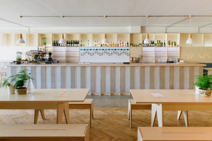 DEZEEN: Fleet creates timber “nest” and zigzagging bar for east London brewery